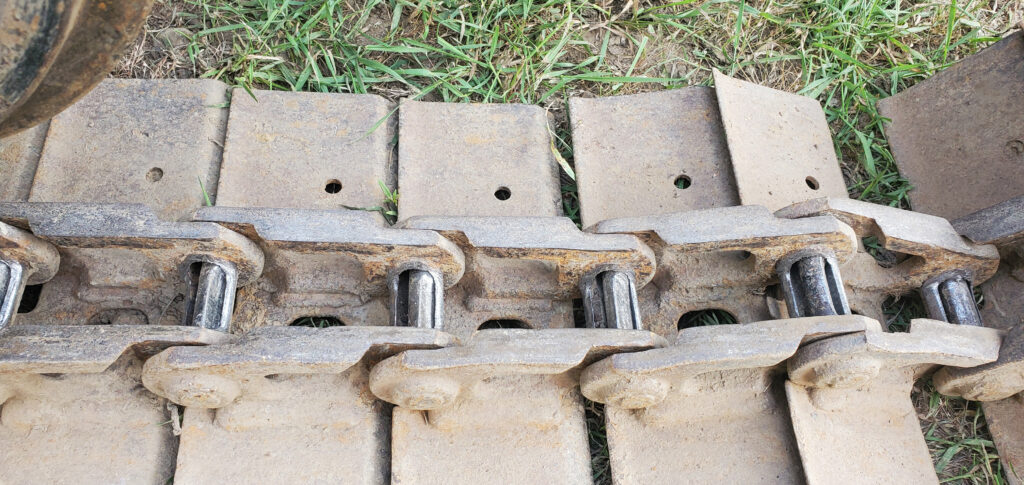 www.steeltracks.com Kubota KH90 steel tracks.